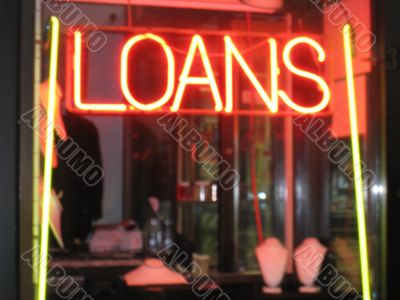 Signs for loans in pawnbrokers shop Signs for loans in pawnbrokers shop