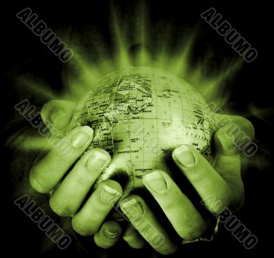 Globe in a girl`s hands