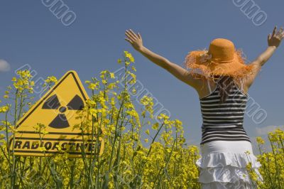 rape field with sign radio-active