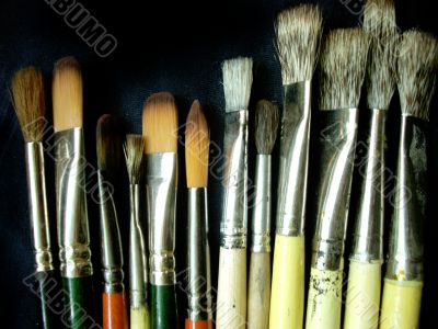 Artistic brushes on a dark background