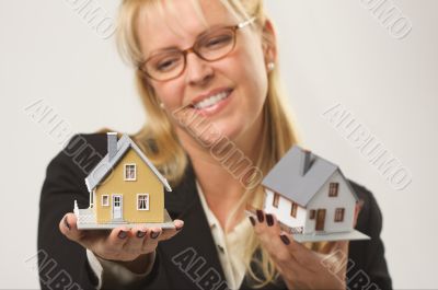 Woman Holding Two Houses Woman Holding Two Houses