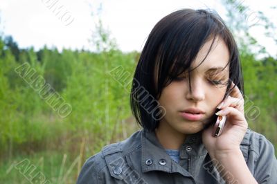 san young girl talking on telephone