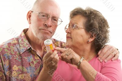 Senior Couple with Prescription Bottle Senior Couple with Prescription Bottle
