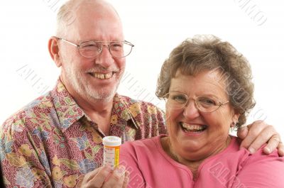 Senior Couple with Prescription Bottle