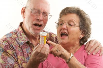 Senior Couple with Prescription Bottle