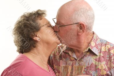 Happy Senior Couple Kissing