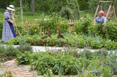 Garden with straw two dolls