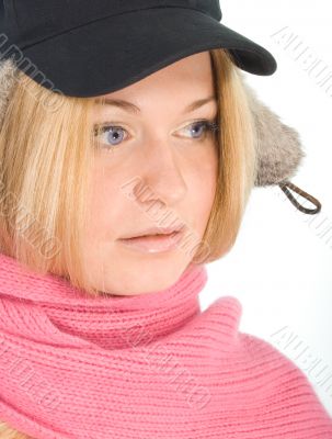 blue-eyed blonde in fur cap and  pink scarf