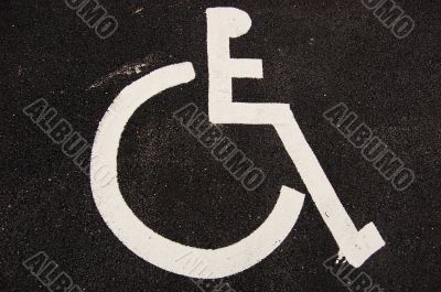 Handicap sign on asphalt