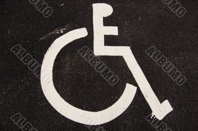 Handicap sign on asphalt Handicap sign on asphalt