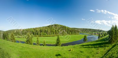 Summer landscape. Village on the river. Panorama.