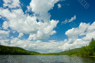 Summer landscape. Clouds above the river. Summer landscape. Clouds above the river.