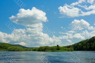 Summer landscape. Clouds above the river. Summer landscape. Clouds above the river.