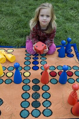 Child playing with a board