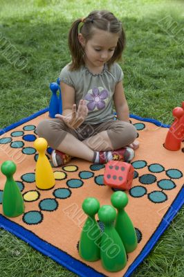 Child playing with a board