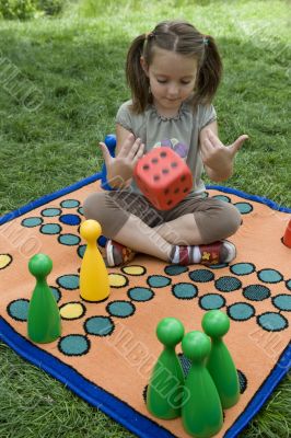 Child playing with a board