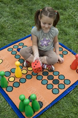 Child playing with a board