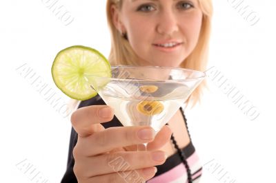Girl reaching to you glass with martini cocktail