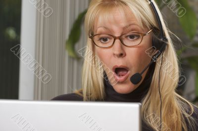 Attractive Businesswoman with Phone Headset