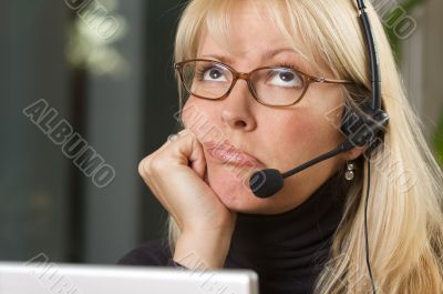Attractive Businesswoman with Phone Headset