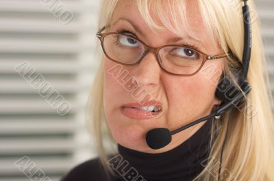 Attractive Businesswoman with Phone Headset