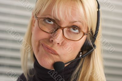 Attractive Businesswoman with Phone Headset