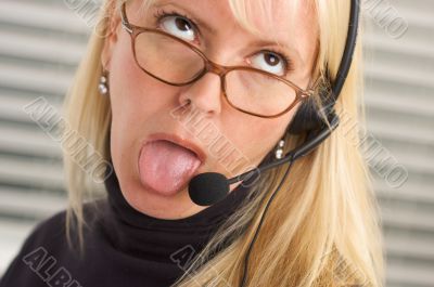 Attractive Businesswoman with Phone Headset