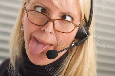 Attractive Businesswoman with Phone Headset