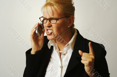Angry Business Woman on Cell Phone