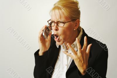 Angry Business Woman on Cell Phone