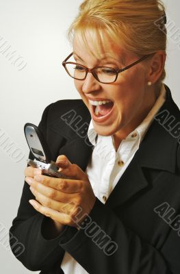 Businesswoman using her cell phone.