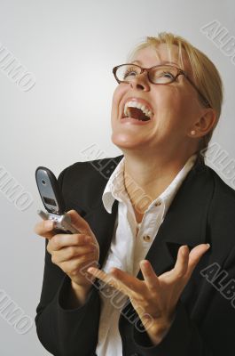 Businesswoman using her cell phone.