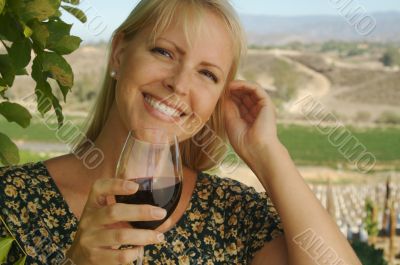 Attractive Woman Sips Wine