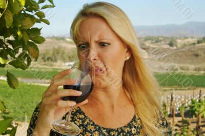 Shocked Attractive Woman Sips Wine