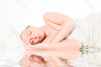 Wellness girl series laying down asleep by the water