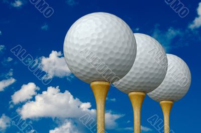 Three Golf Balls &amp; Tees