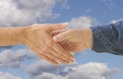 Man and woman shaking hands. Man and woman shaking hands.