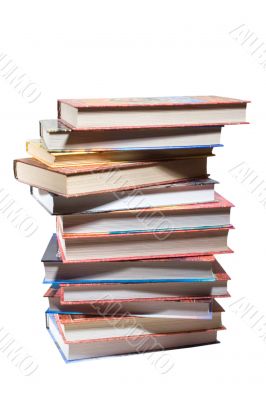 dozen different books, stacked