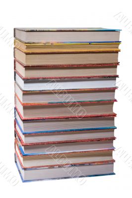 dozen different books, stacked