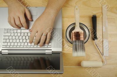 Handyman Using Laptop