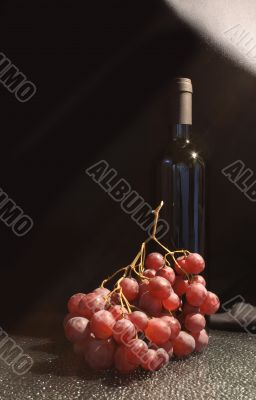 Red wine and grapes