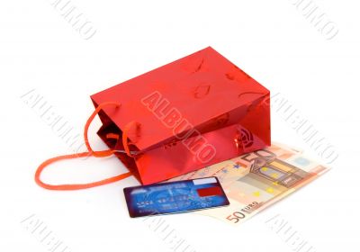 Shopping bag with euro banknotes and credit card
