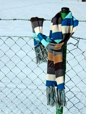 fence with scarf