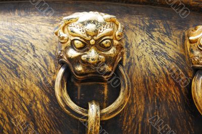 Ancient bronze lions as a handle of vat