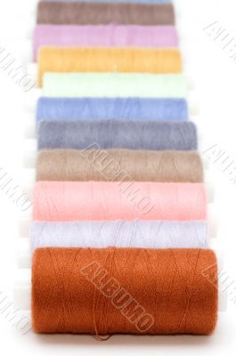 sewing rolls on white