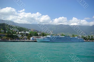 large white ship moored at Yalta port