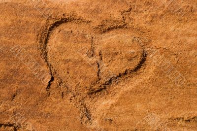 Heart scraped into sandstone