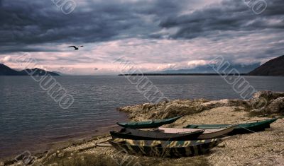 waterscape with boats and dramatic sky