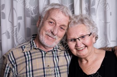 Elderly couple posing