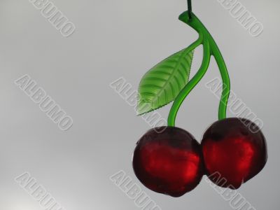 red plastic cherries